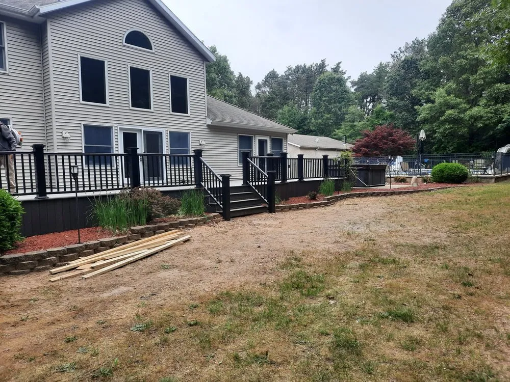 Custom outdoor landscaping with custom design across Coloma, MI - Those Guys Property Maintenance