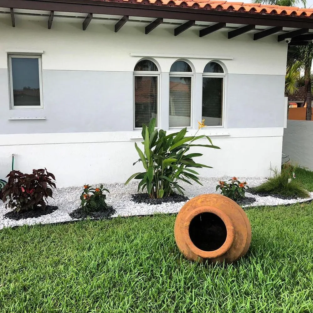 Custom landscape installation for residential properties in Miami, FL by Those Plant Guys