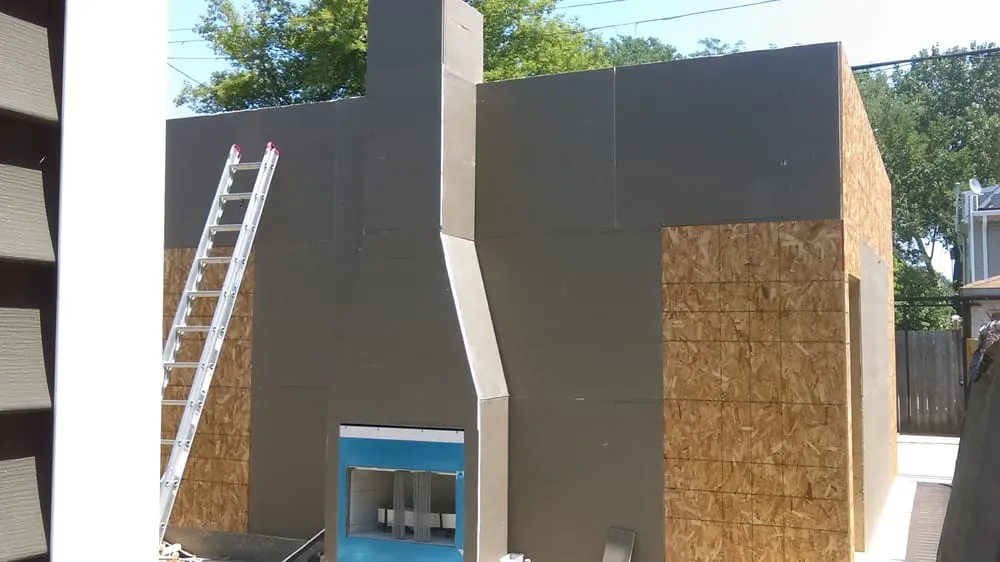 Professional lawn mowing service with custom design in Niles, IL by Three Brothers Construction