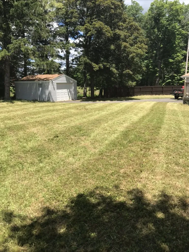 Professional landscaping services for homes in Valatie, NY by Three Daughters Lawn Care & Decorative Concrete