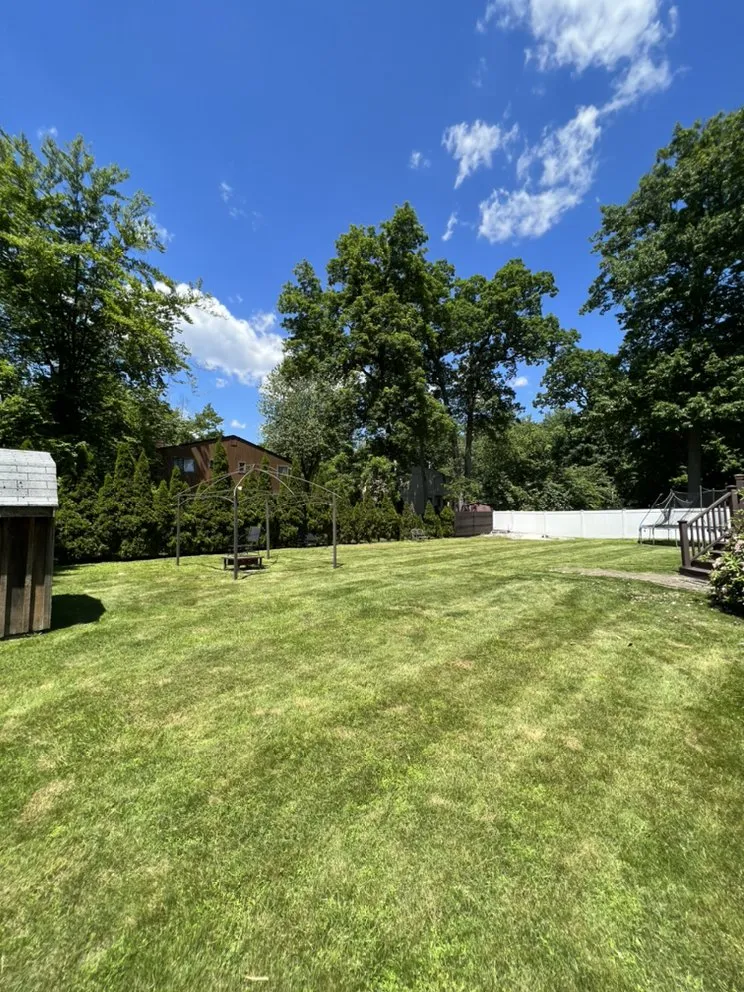 Expert lawn mowing service with custom design in Stony Point, NY by Three Roses Landscape