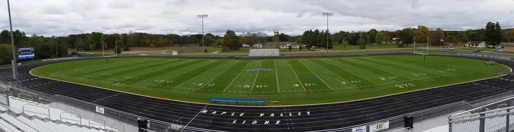 Professional garden landscaping with custom design in Webberville, MI by Three Wooden Crosses Lawn Landscape Design