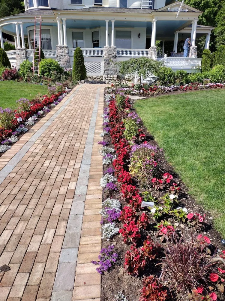 Affordable lawn care service with custom design across Webberville, MI - Three Wooden Crosses Lawn Landscape Design