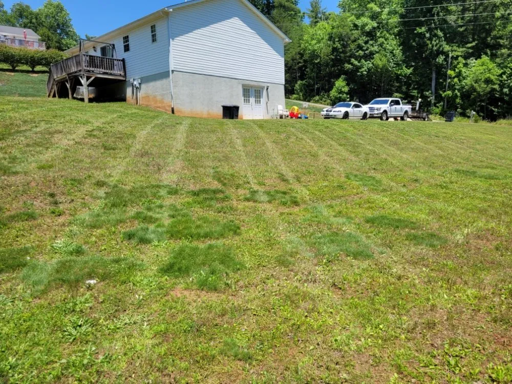 Affordable landscape design with custom design in Lenoir, NC by Throw'N Grass Landscaping