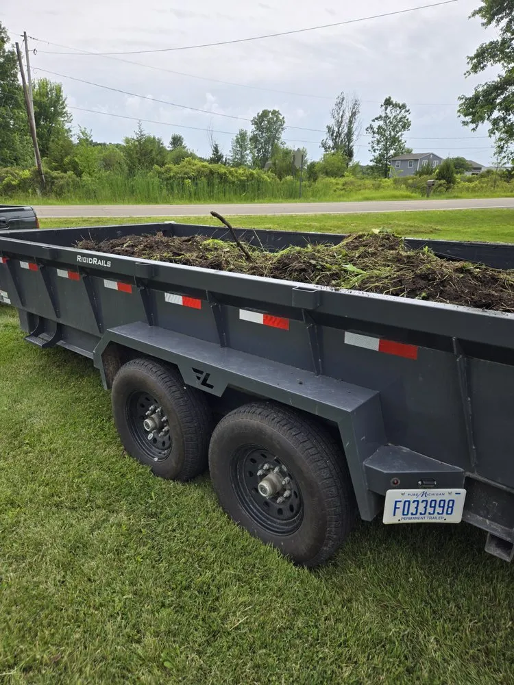 Custom residential landscaping for year-round maintenance across North Branch, MI - Thumbs up excavation