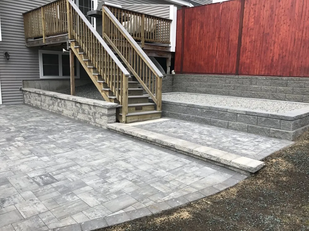 Professional lawn mowing service with custom design in Woburn, MA by Tibur Landscaping and Irrigation