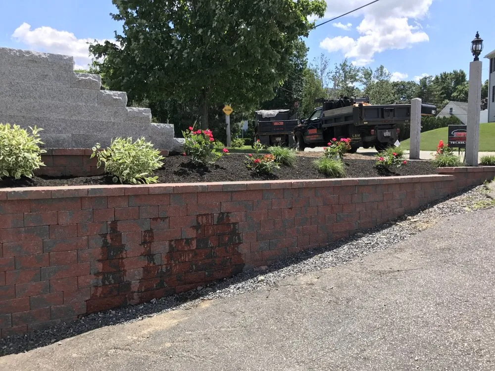 Custom yard cleanup service for outdoor upgrades in Woburn, MA by Tibur Landscaping and Irrigation