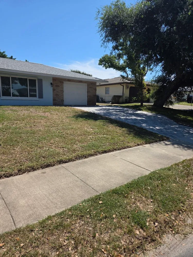 Reliable lawn care service for beautiful yards in New Smyrna Beach, FL by Tidal Wave Enterprises