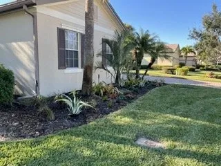 Custom yard cleanup service for homes in Fort Myers, FL by Tide Water Landscape of Florida