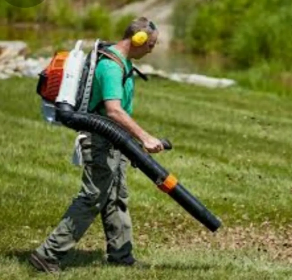 Professional yard cleanup service for year-round maintenance in Dubuque, IA by Tidy Up Lawncare and Maintenance