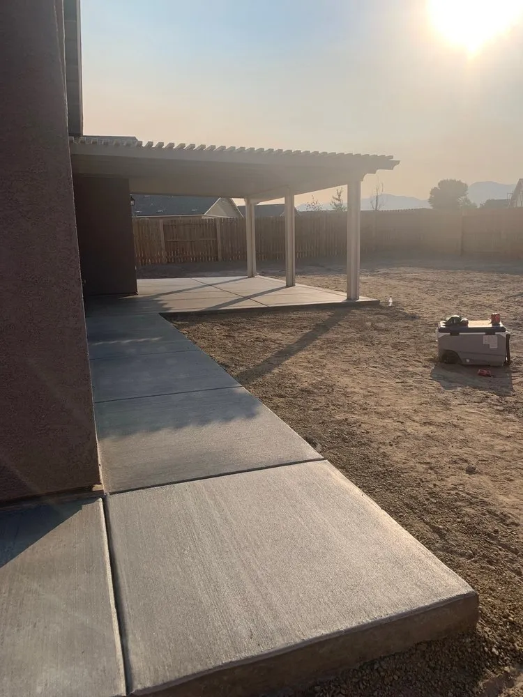 Custom lawn mowing service for residential properties in Fernley, NV by Tiger Concrete and Landscaping