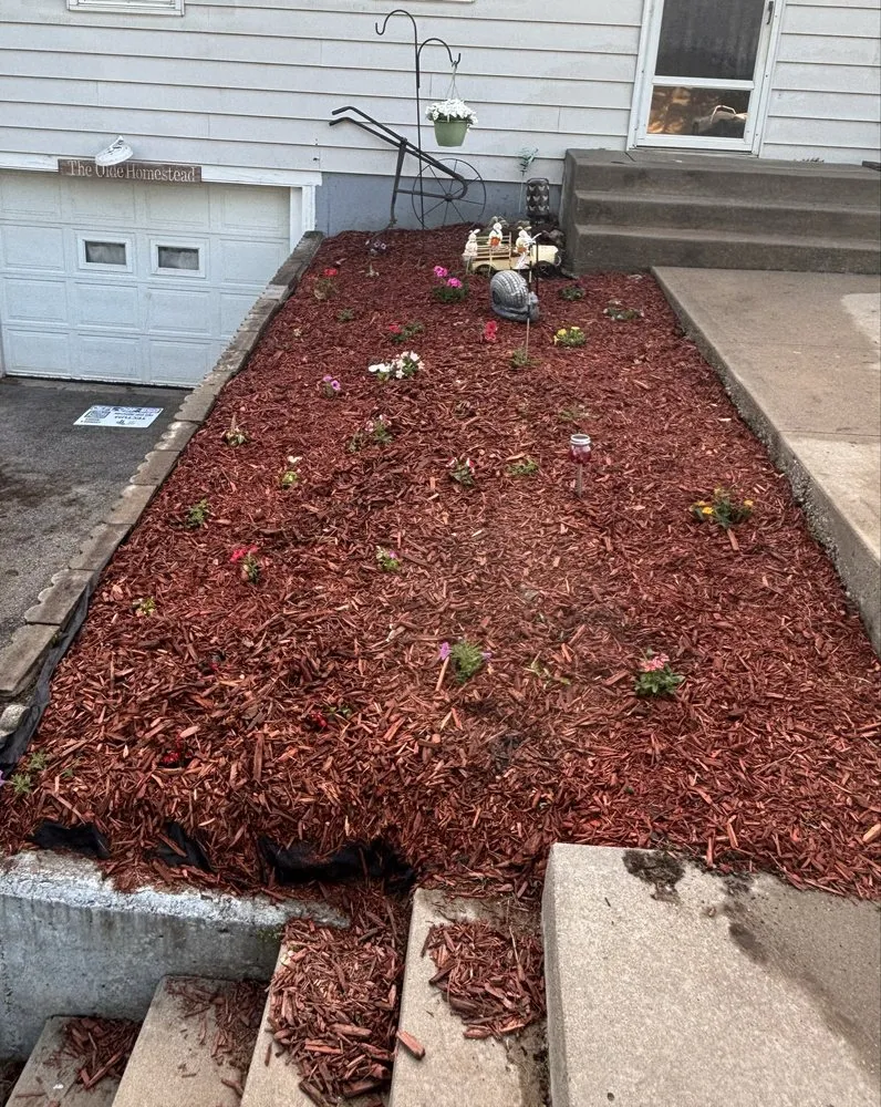 Custom landscape installation with custom design across Wellington, MO - Tigers Contracting