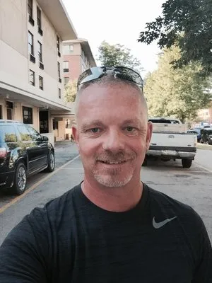 Tighe Lawn Care Logo