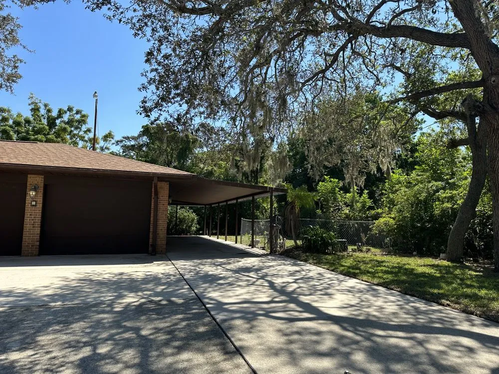 Affordable landscape installation with custom design in Sarasota, FL by Tikal Landscaping