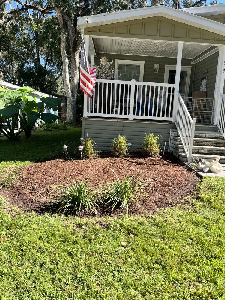 Expert lawn mowing service for residential properties in Brooksville, FL by Tillys Garden and Landscape