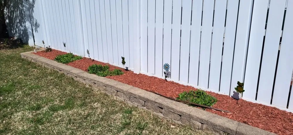 Expert yard cleanup service for year-round maintenance in Fremont, NE by Tilson's Lawn Services