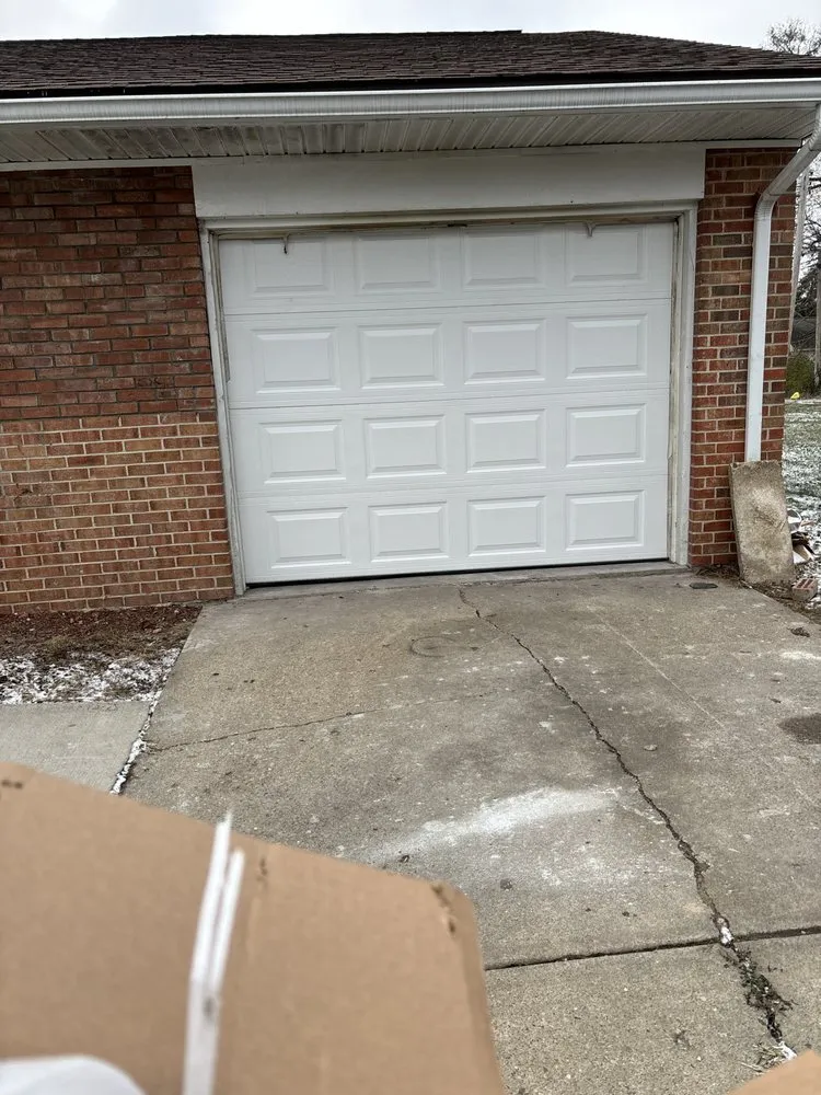 Trusted lawn care service in West Terre Haute, IN by Tim Hedden Garage Doors