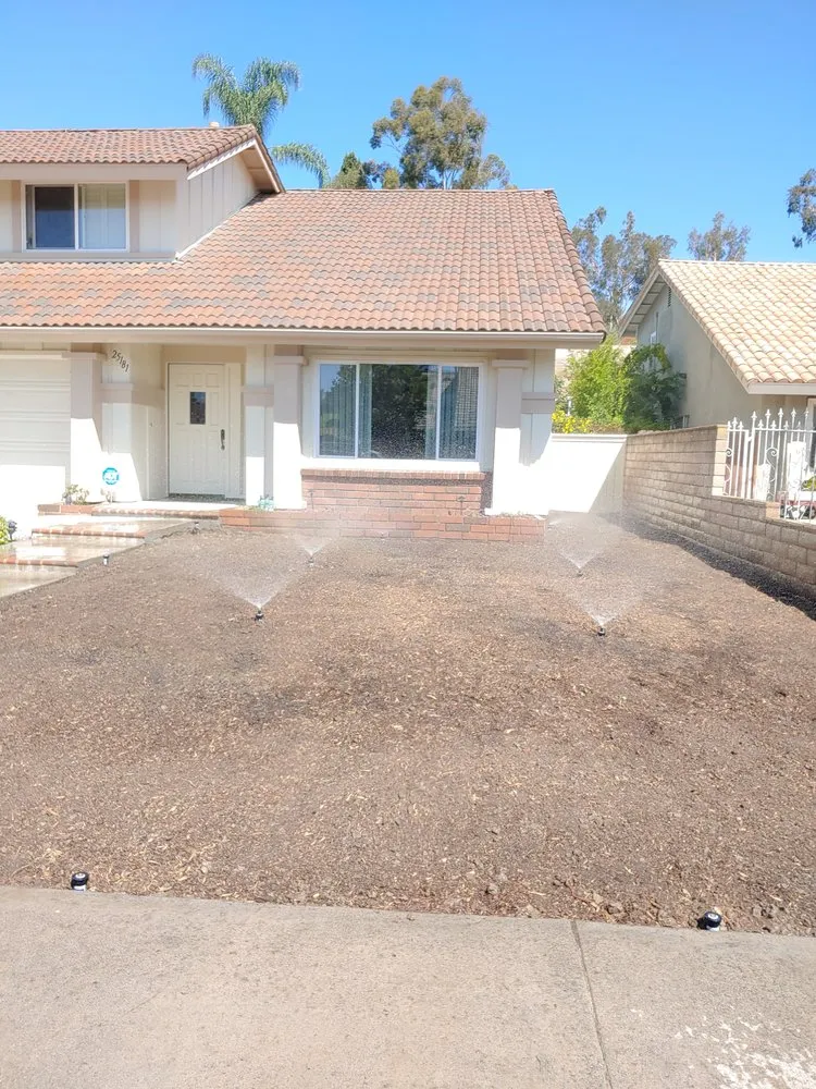 Custom lawn mowing service with custom design in Irvine, CA by Tim Ynclan's Artistic Tree Service