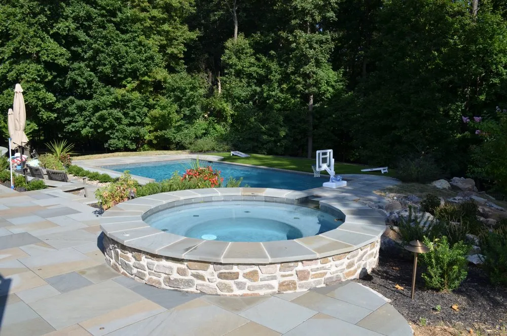 Professional lawn care service with custom design in Blue Bell, PA by Timber and Stone Landscape Design