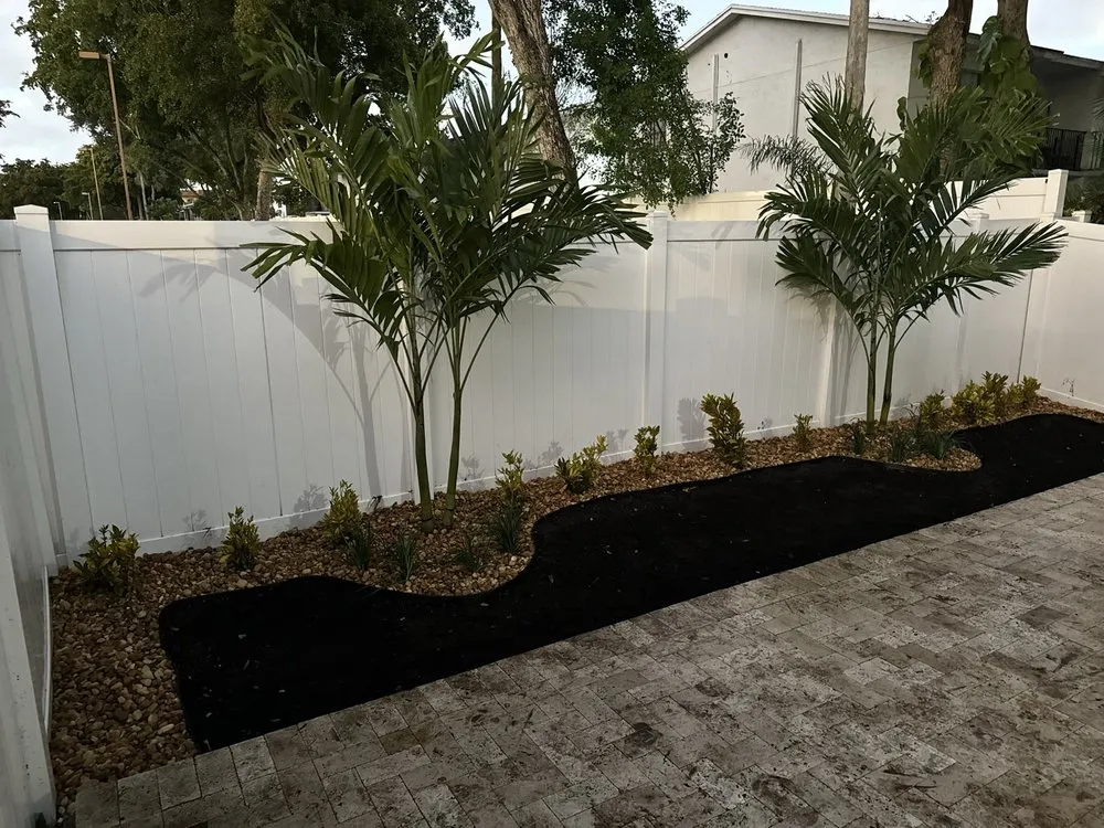 Expert yard maintenance for residential properties in Fort Lauderdale, FL by Timber Trees Landscape & Design