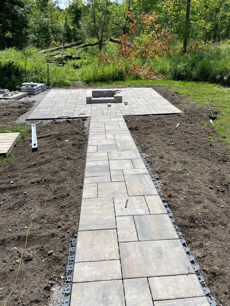 Reliable lawn mowing service in Metamora, MI by Timbercrest Construction