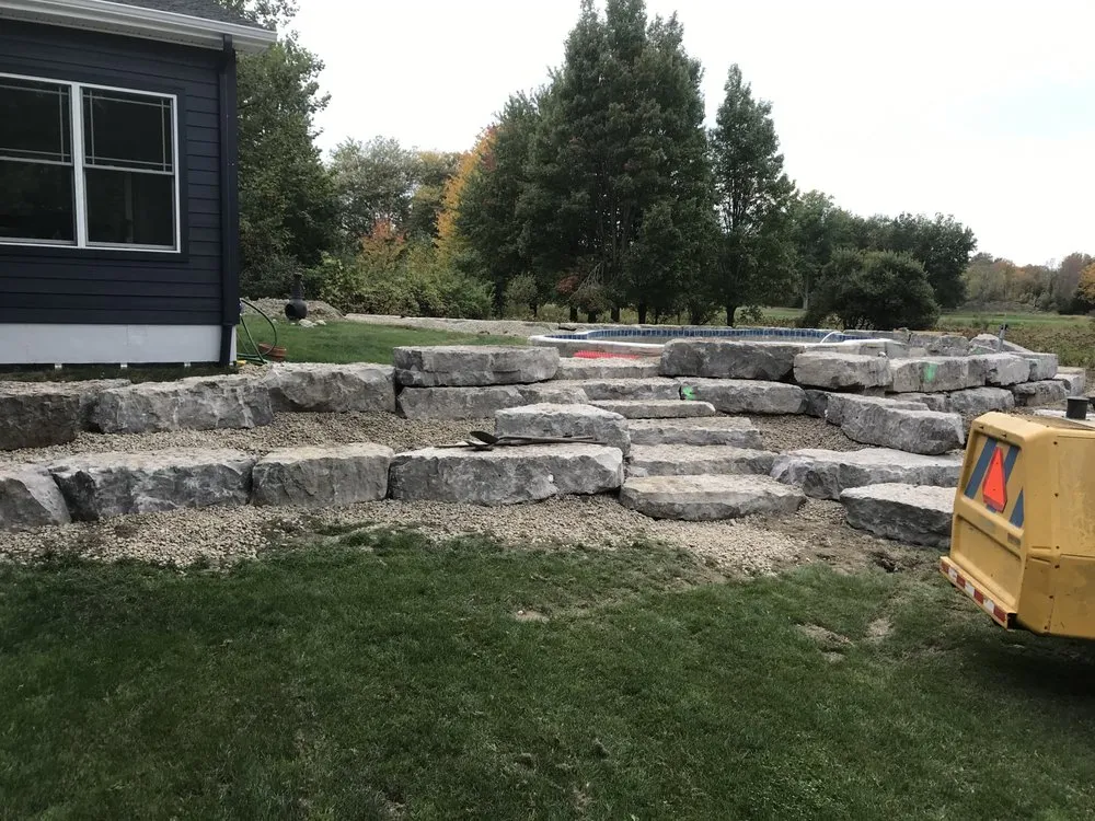 Affordable lawn care service in East Aurora, NY by Timberline Hardscapes