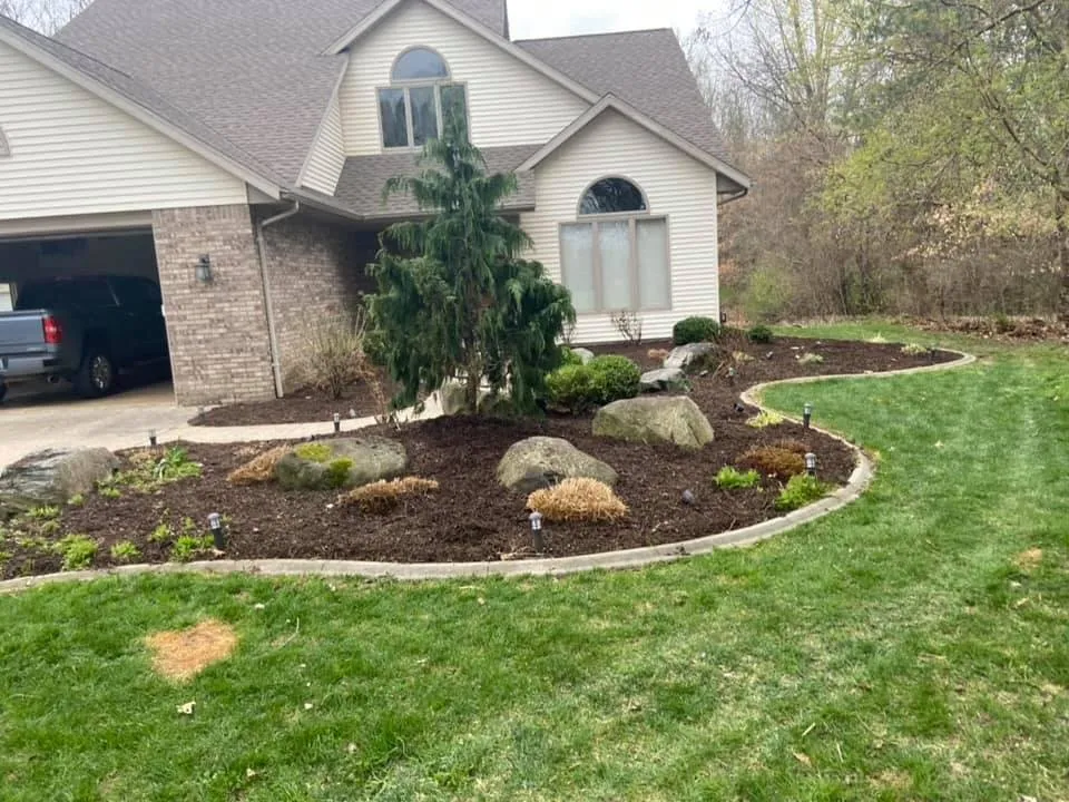 Affordable lawn mowing service for year-round maintenance in Rockford, MI by Timberline Landscaping & Management