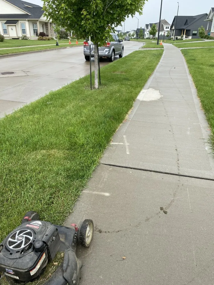 Custom landscape design in Ankeny, IA by Timblins Cleaning and Hualing