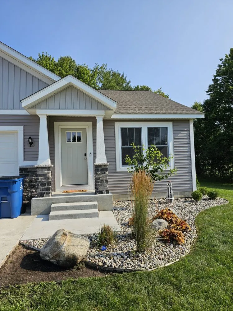 Expert yard maintenance for residential properties across Holland, MI - Timeless Outdoors