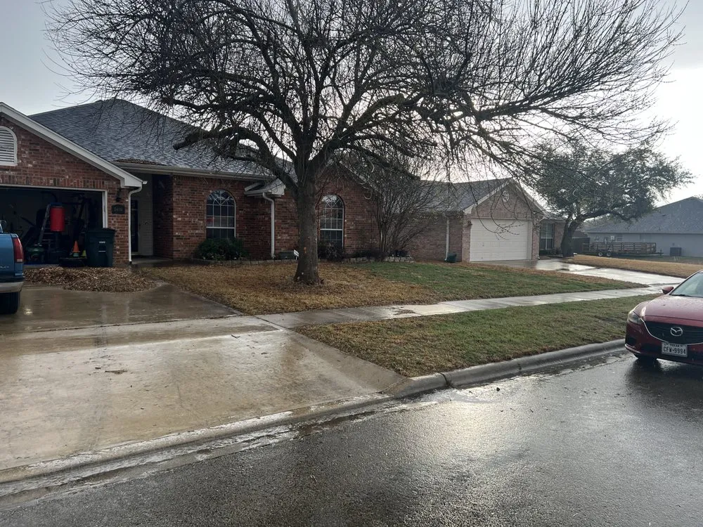 Custom landscape design in Smithville, TX by Timmy’s Lawn Care