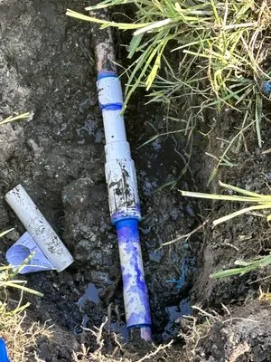 Timothy on Time Irrigation and Landscape Logo