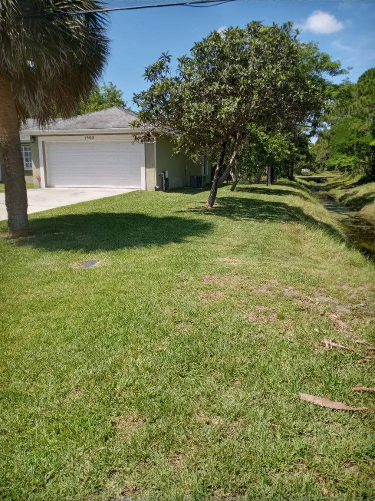 Professional yard maintenance in Fort Pierce, FL by Timothy's Land Services