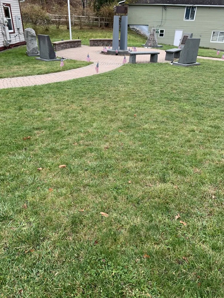 Professional yard maintenance with custom design across Port Jervis, NY - Tim's Grass Cutting Service