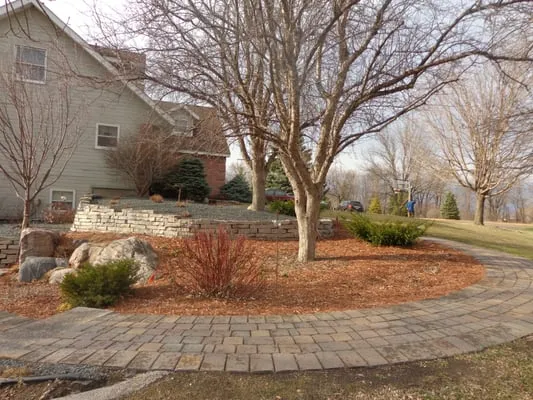 Tim's Lawn & Landscaping Logo