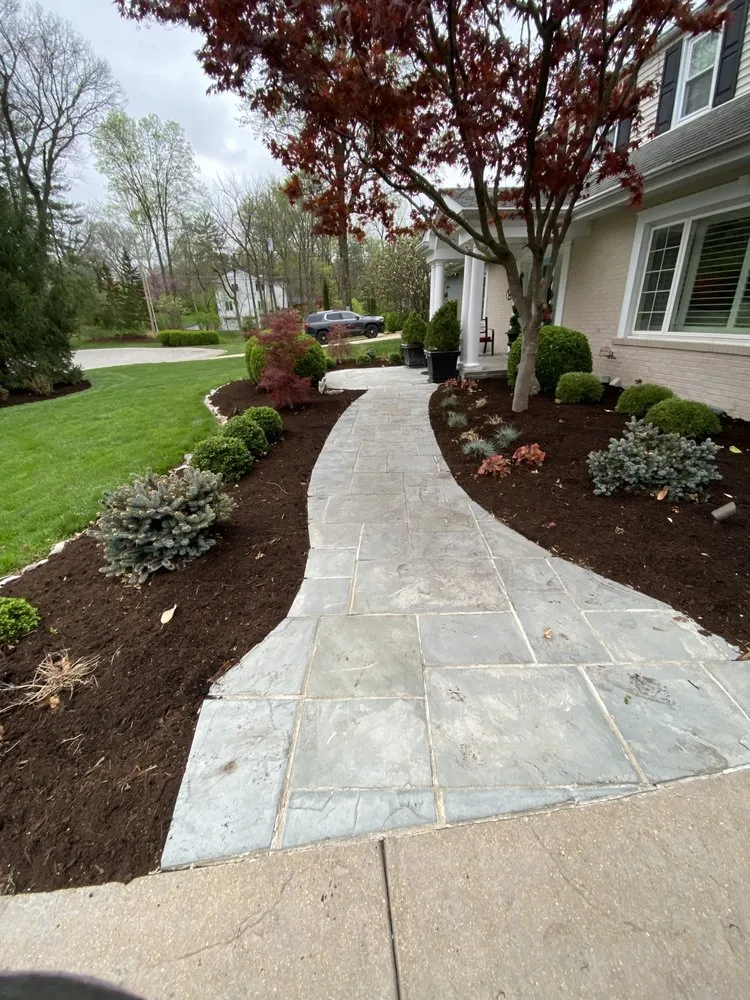 Custom landscaping services for beautiful yards in Saint Louis, MO by Tims Mow and Blow