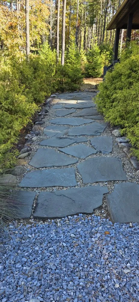 Top-rated lawn mowing service with custom design in Nebo, NC by Tino Landscapes