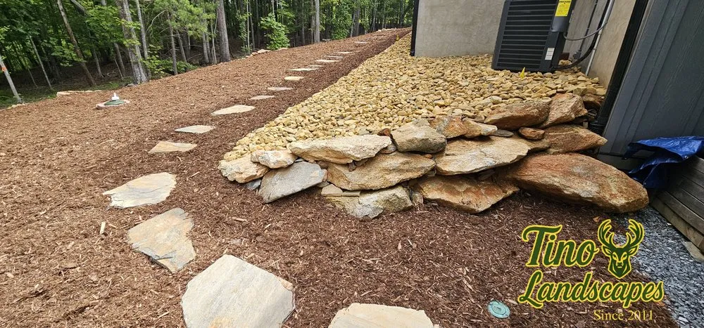 Custom yard cleanup service for year-round maintenance in Nebo, NC by Tino Landscapes