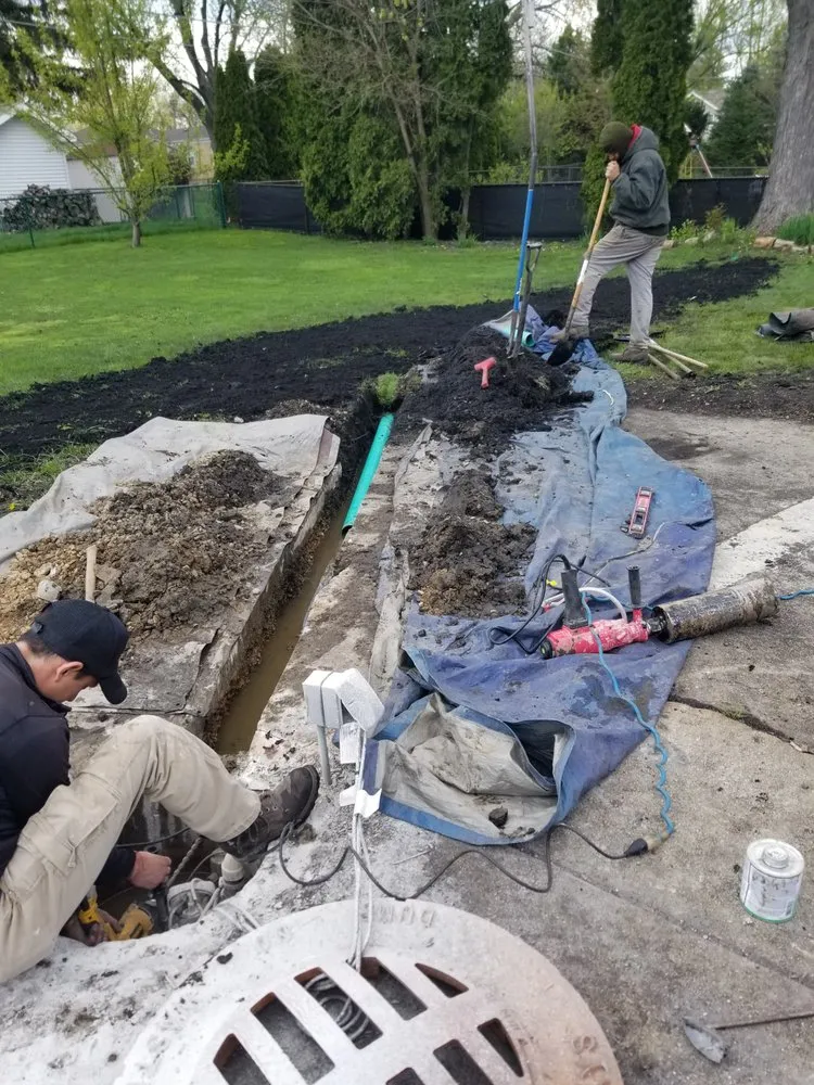 Professional lawn care service experts serving Elgin, IL - Tino's Landscape & Drainage Solution's