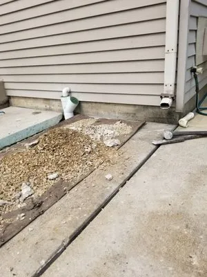 Tino's Landscape & Drainage Solution's Logo