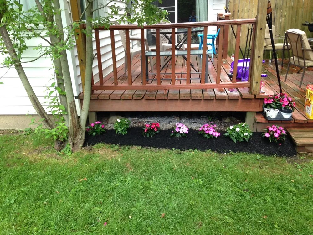 Affordable lawn mowing service with custom design in Williamsville, NY by Titan Landscapes