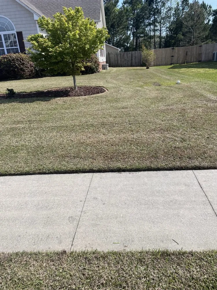 Trusted lawn mowing service for homes in Hubert, NC by Titan Landscaping