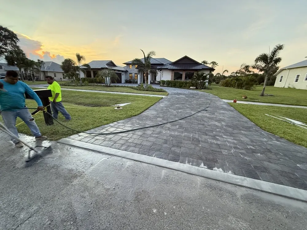 Reliable lawn care service for homes in West Melbourne, FL by Titan Pavers & Dali Pools