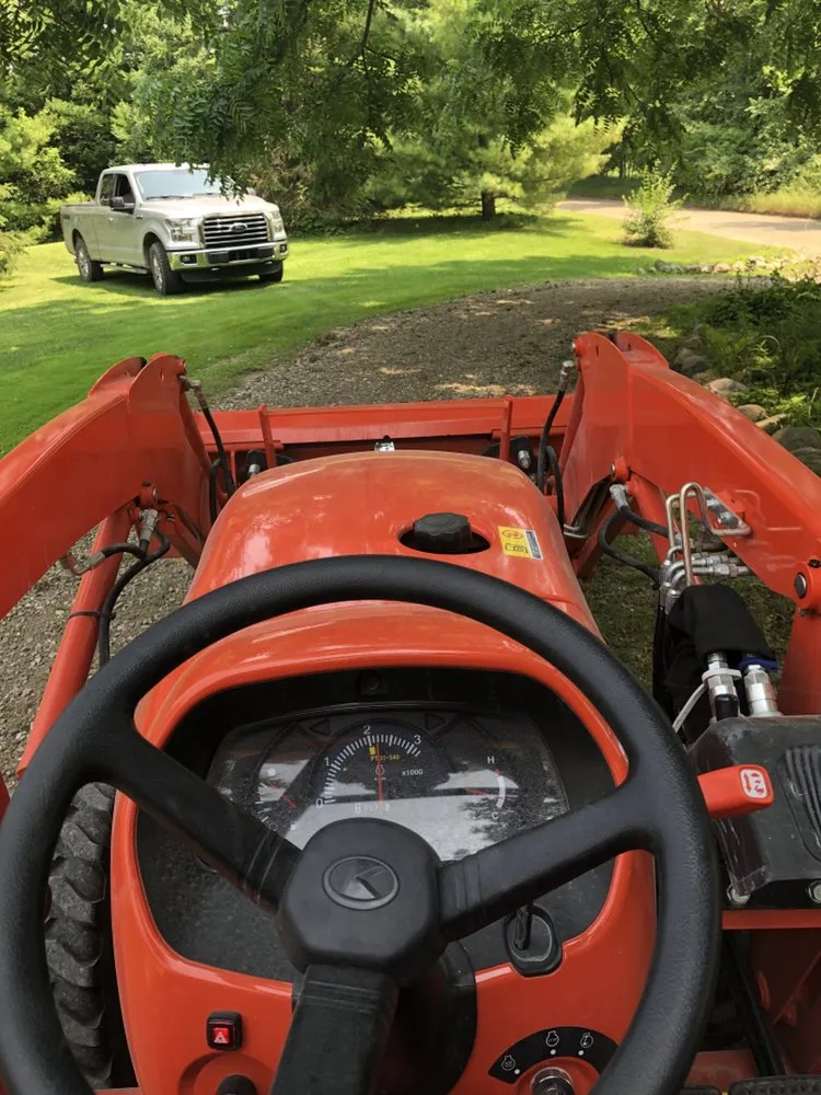 Local yard cleanup service experts serving Romeo, MI - Titan Tractor Works