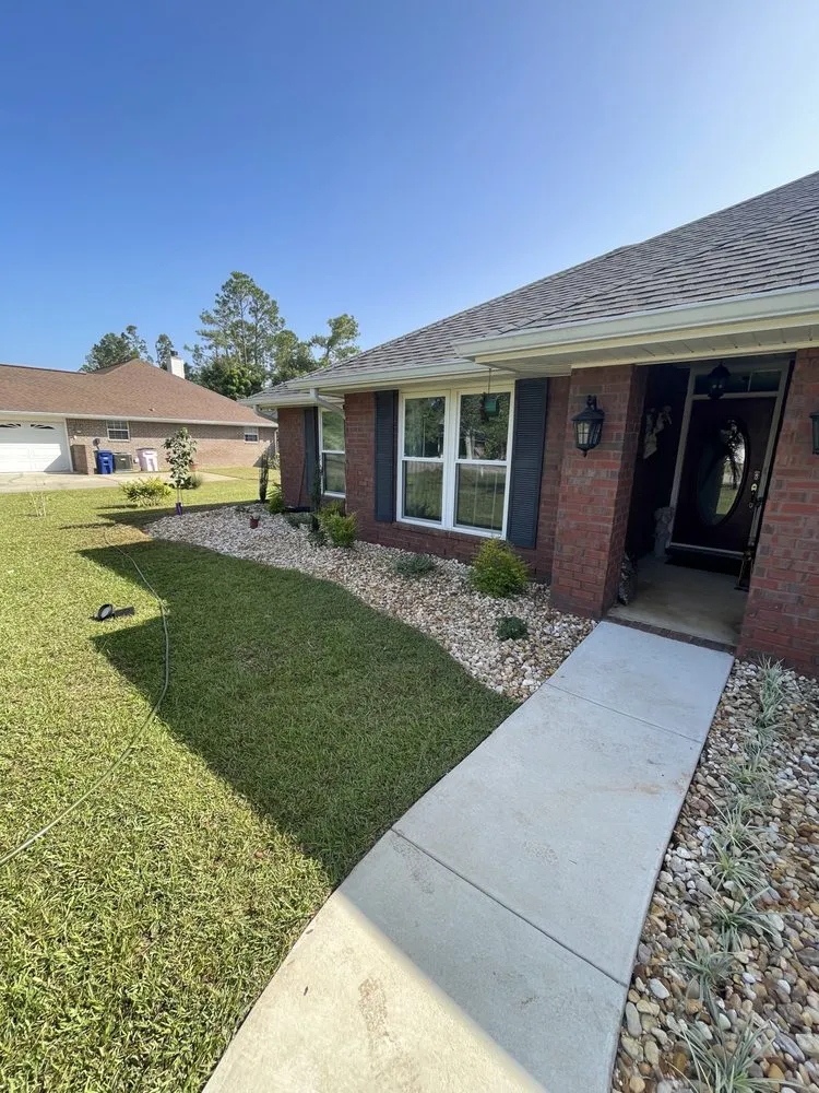 Professional lawn mowing service in Foley, AL by Titans Property Services