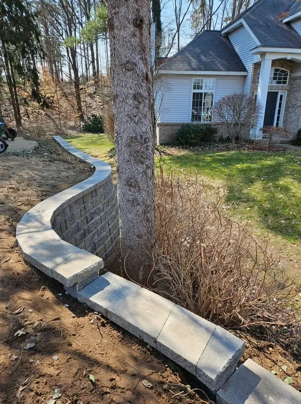 Expert lawn mowing service for outdoor upgrades in Fennville, MI by T&J Hardscapes