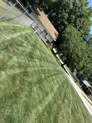 T&J Lawn Care Services Logo