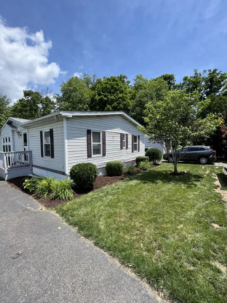 Affordable landscape installation with custom design in Beacon Falls, CT by TJ Schryvers Landscaping