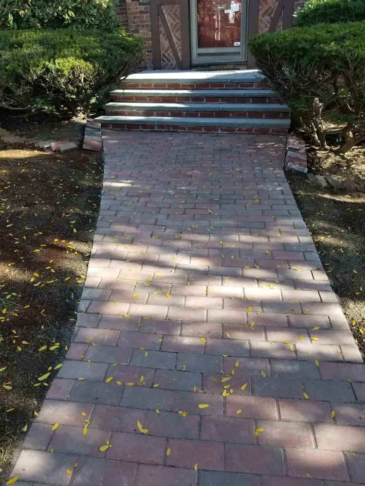 Professional lawn care service for outdoor upgrades in Belmont, MA by Tj Sullivan Landscaping