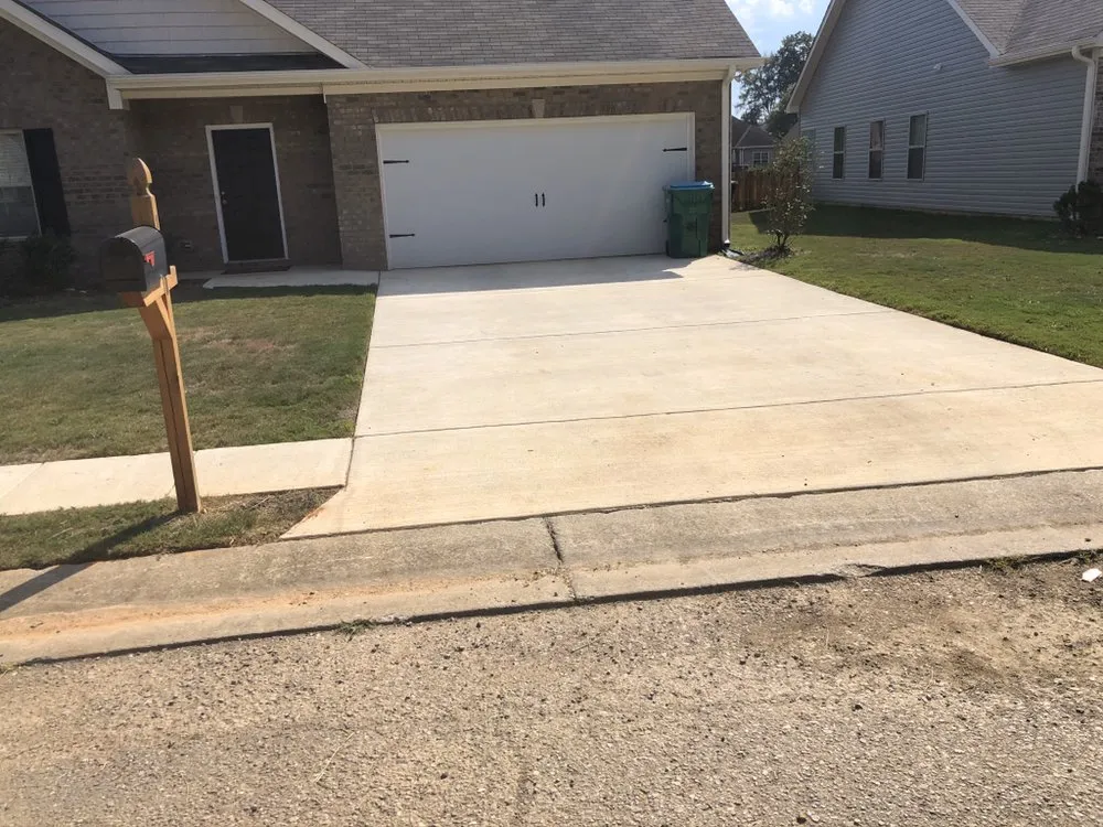Custom lawn care service for residential properties in Centreville, AL by TJS Lawn Service