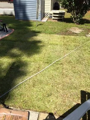 T&K Landscaping and Designs Logo